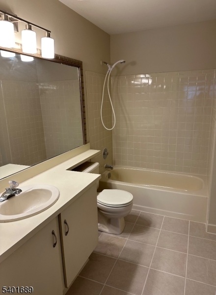 236 Irving Place Basking Ridge, NJ 07920 - Photo 13 of 18 a bathroom with a toilet sink vanity and shower