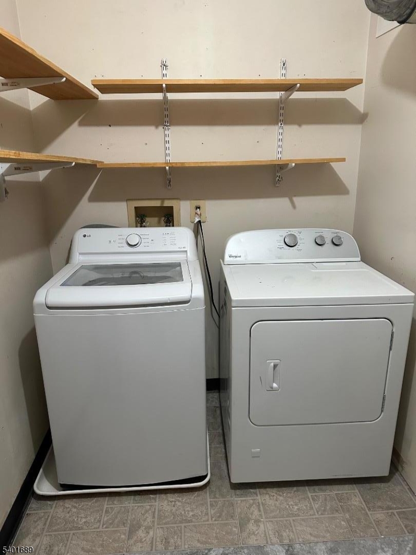 236 Irving Place Basking Ridge, NJ 07920 - Photo 15 of 18 a utility room with dryer and washer