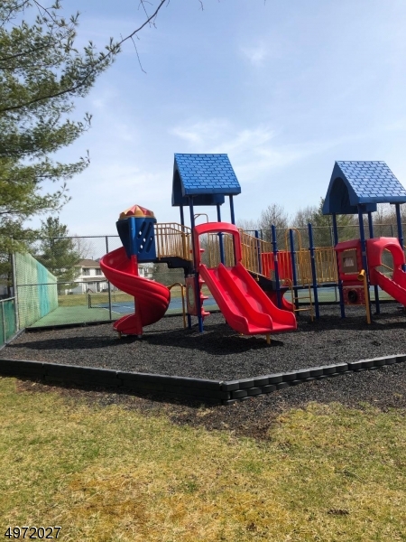 236 Irving Place Basking Ridge, NJ 07920 - Photo 16 of 18 a view of swimming pool with a yard