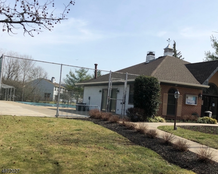 236 Irving Place Basking Ridge, NJ 07920 - Photo 18 of 18 a front view of a house with a yard