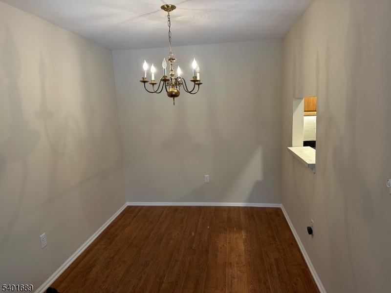 236 Irving Place Basking Ridge, NJ 07920 - Photo 8 of 18 a view of wooden floor in an empty room