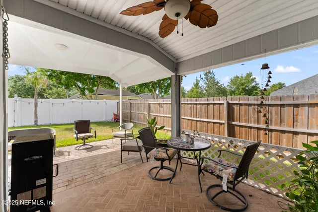 a garden view with a seating space
