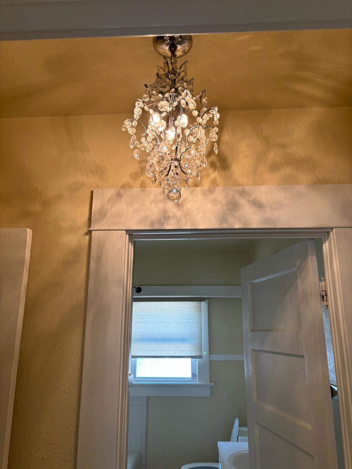 417 Enslen Avenue Modesto, CA 95354 - Photo 17 of 24 a bathroom with a sink and mirror