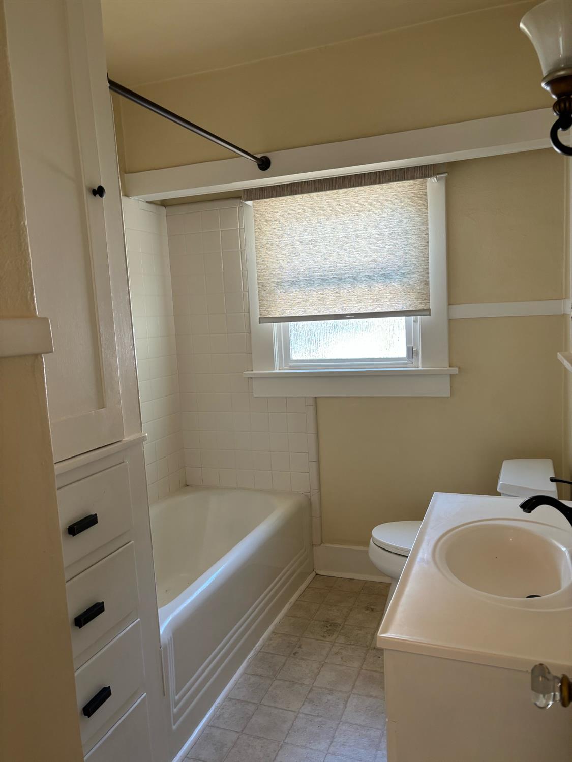 417 Enslen Avenue Modesto, CA 95354 - Photo 18 of 24 a bathroom with sink and bathtub