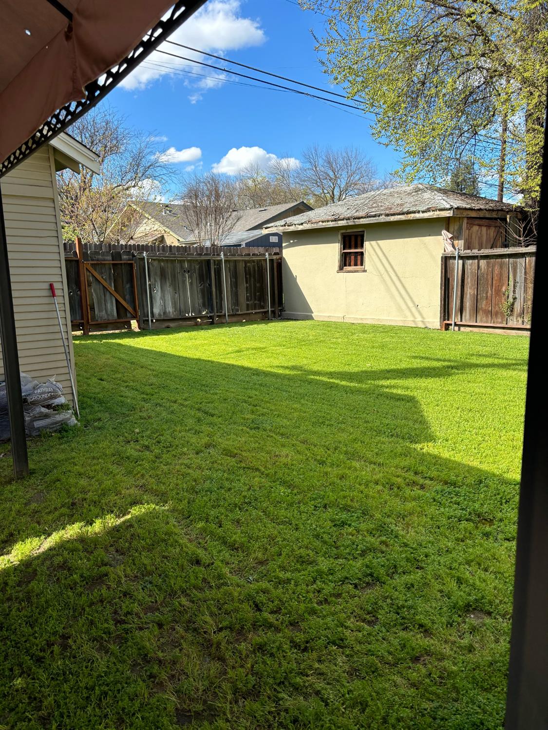 417 Enslen Avenue Modesto, CA 95354 - Photo 23 of 24 a view of a house with a yard