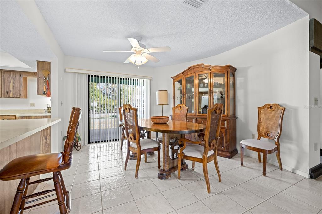 623 Racoon Lane Lorida, FL 33857 - Photo 14 of 80 a view of a dining room with furniture and chandelier