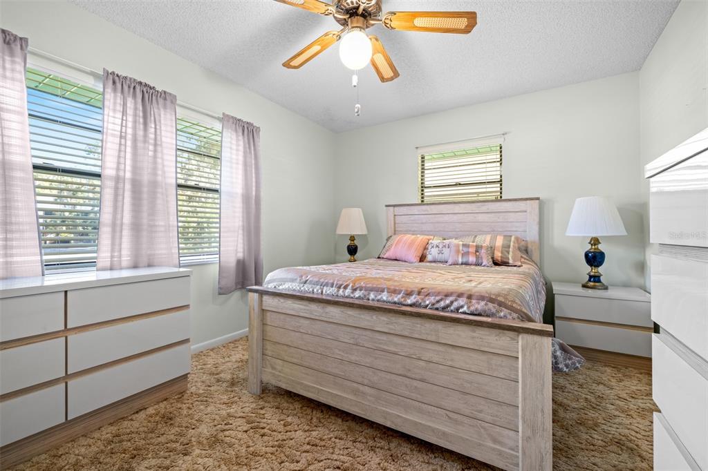 623 Racoon Lane Lorida, FL 33857 - Photo 25 of 80 a bedroom with a bed and window