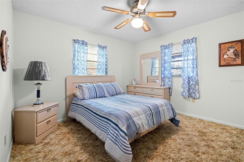 623 Racoon Lane Lorida, FL 33857 - Photo 30 of 80 a bedroom with bed and window