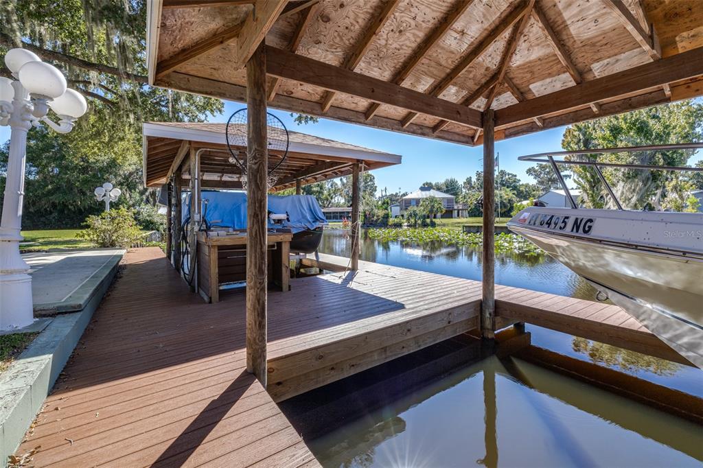 623 Racoon Lane Lorida, FL 33857 - Photo 48 of 80 a view of a swimming pool with a patio