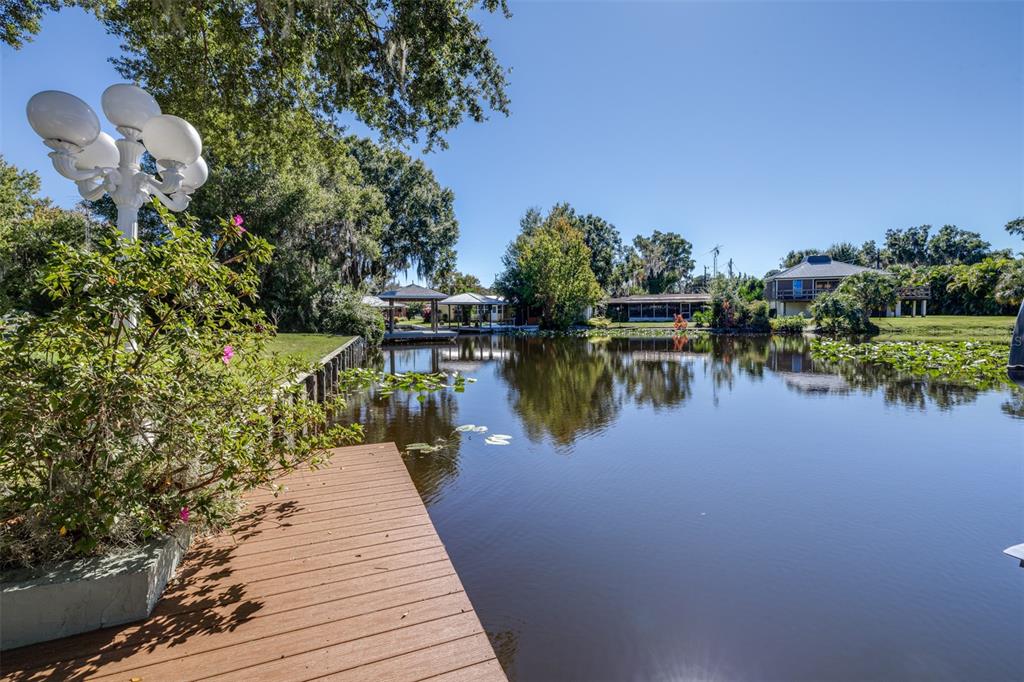 623 Racoon Lane Lorida, FL 33857 - Photo 54 of 80 a view of a lake with boats and trees in the background