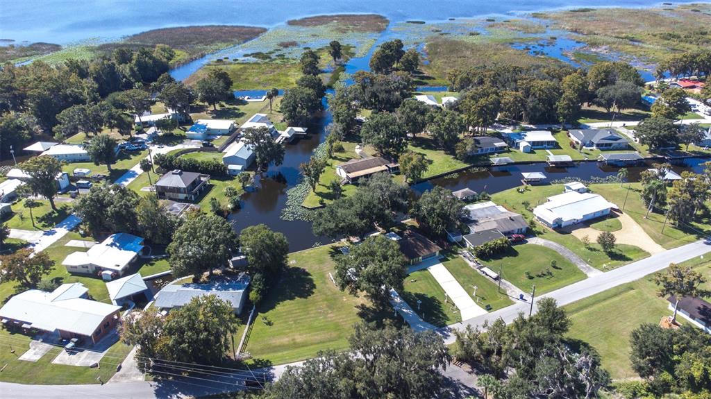 623 Racoon Lane Lorida, FL 33857 - Photo 60 of 80 an aerial view of a residential houses with outdoor space