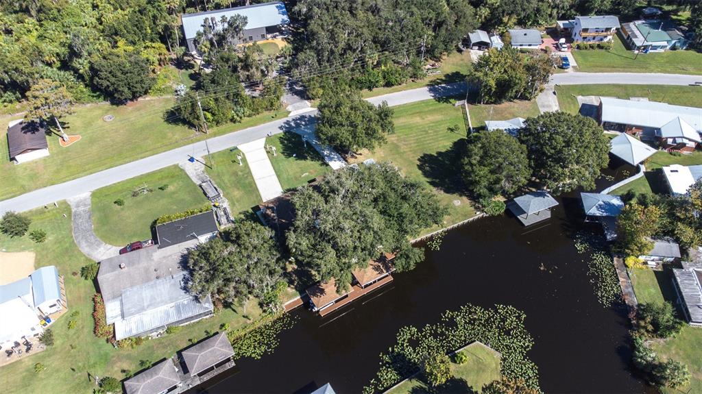 623 Racoon Lane Lorida, FL 33857 - Photo 72 of 80 an aerial view of a house with a yard and lake view