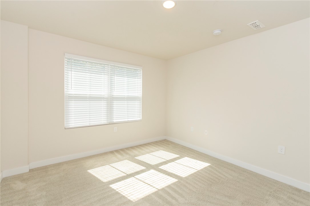 233 Scenic Road Anderson, SC 29621 - Photo 29 of 50 A well-lit bedroom offering a neutral palette, awaiting your personal touch.
