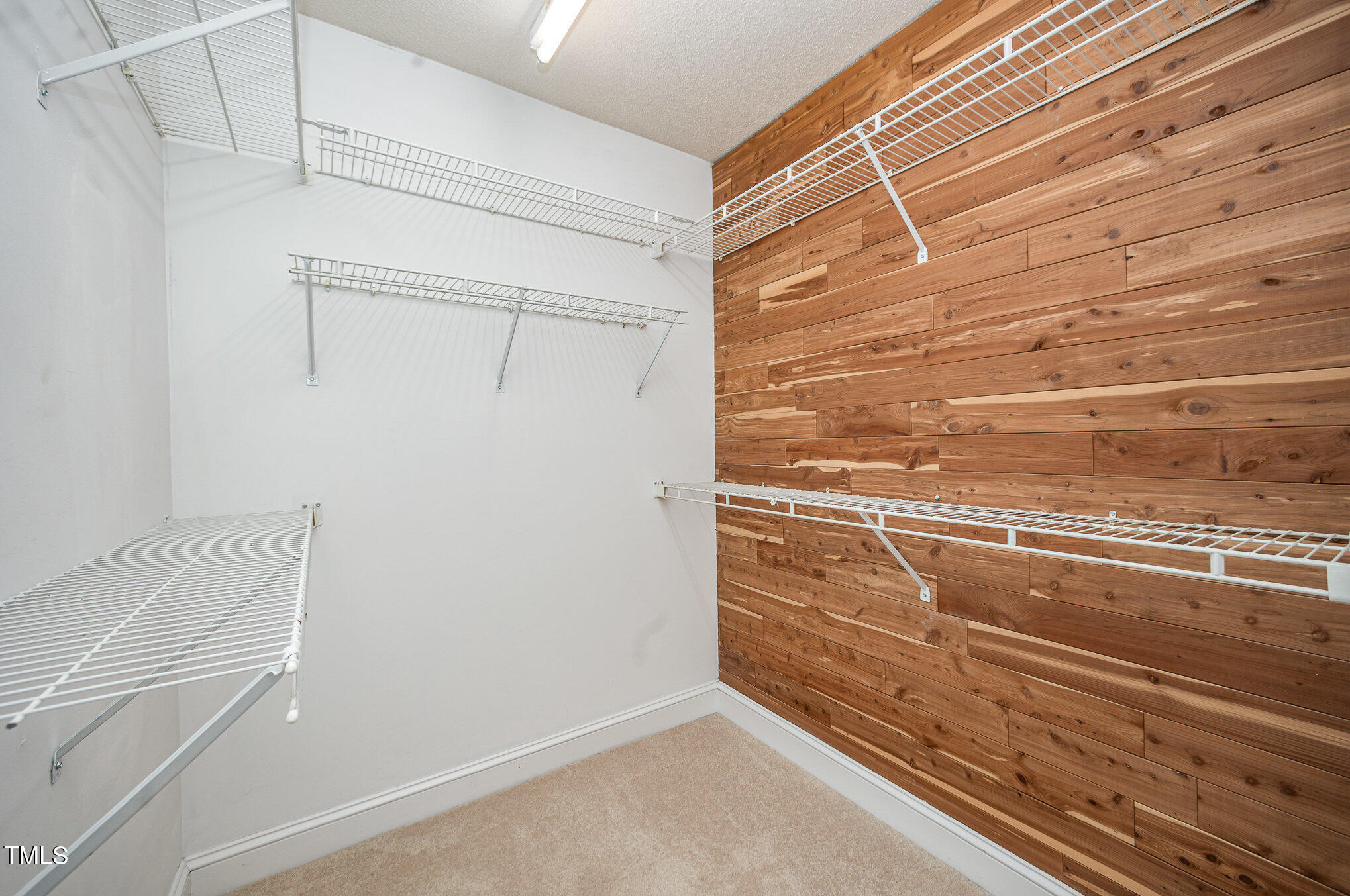 7605 Sandy Lake Court Raleigh, NC 27613 - Photo 30 of 51 One of two spacious primary closets.