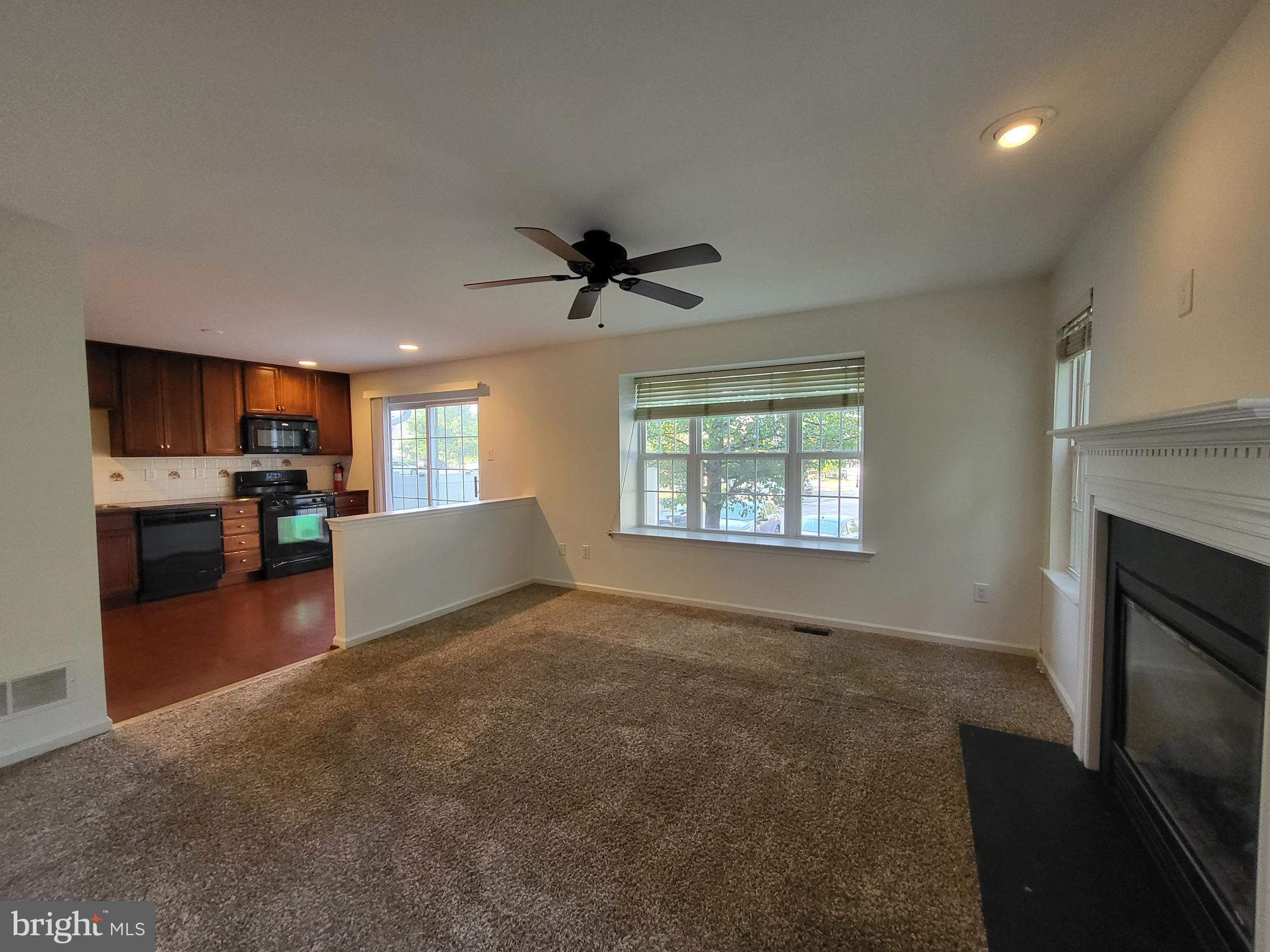 284 Flagstone Road, Unit 5 Chester Springs, PA 19425 - Photo 12 of 25 a living room with furniture and a fireplace