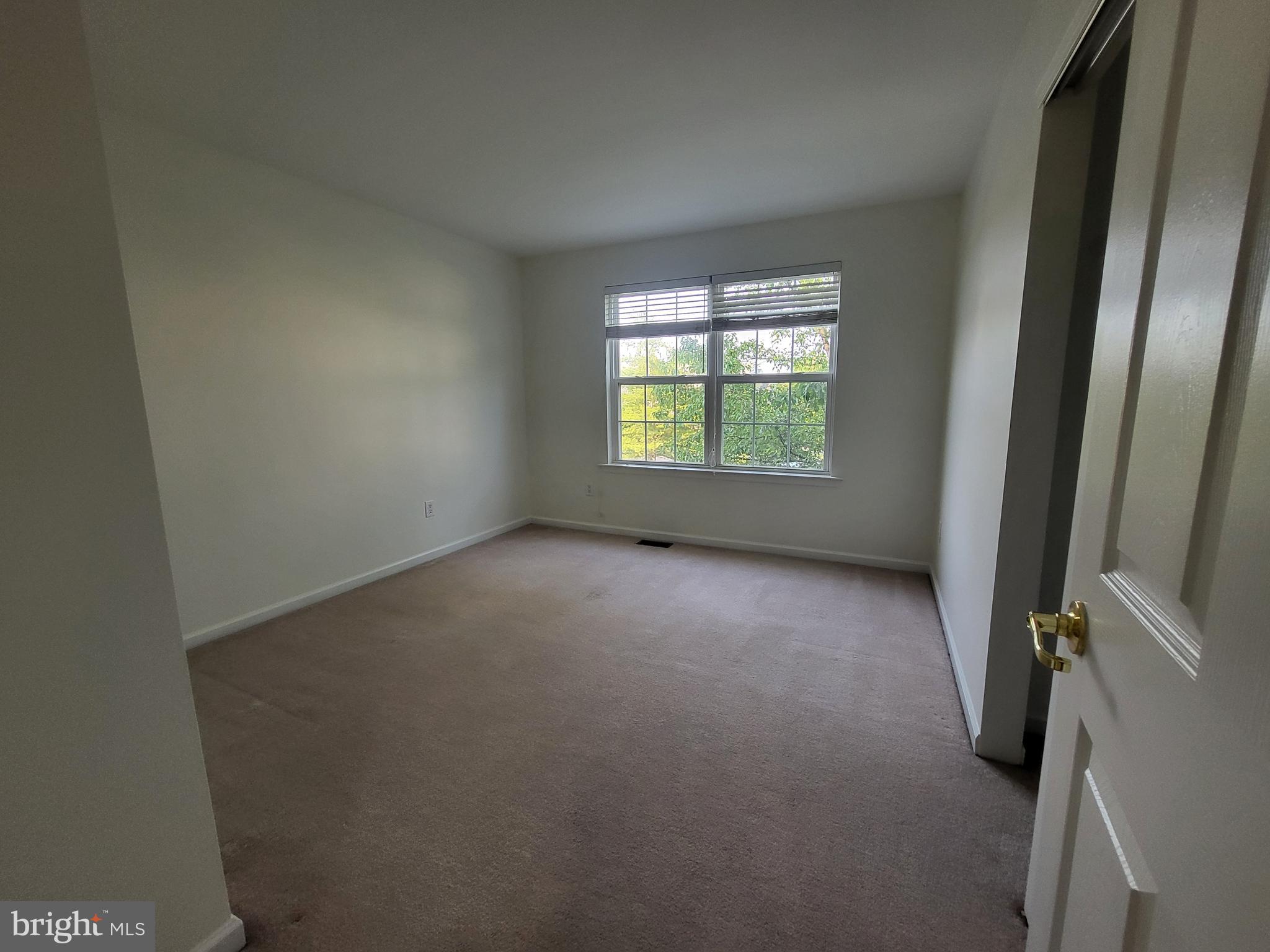 284 Flagstone Road, Unit 5 Chester Springs, PA 19425 - Photo 17 of 25 an empty room with windows