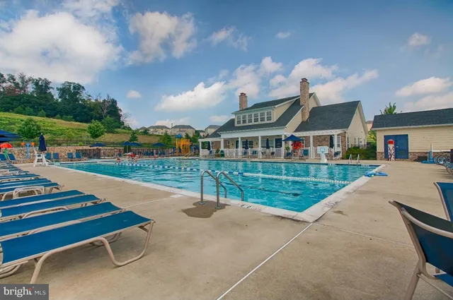 a view of multiple houses with a yard