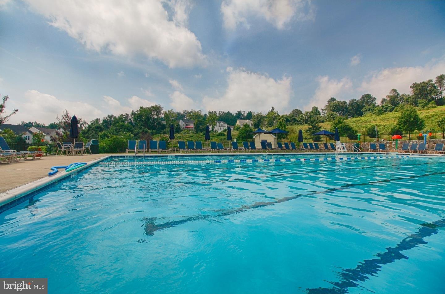 284 Flagstone Road, Unit 5 Chester Springs, PA 19425 - Photo 25 of 25 a view of a golf course with a lake