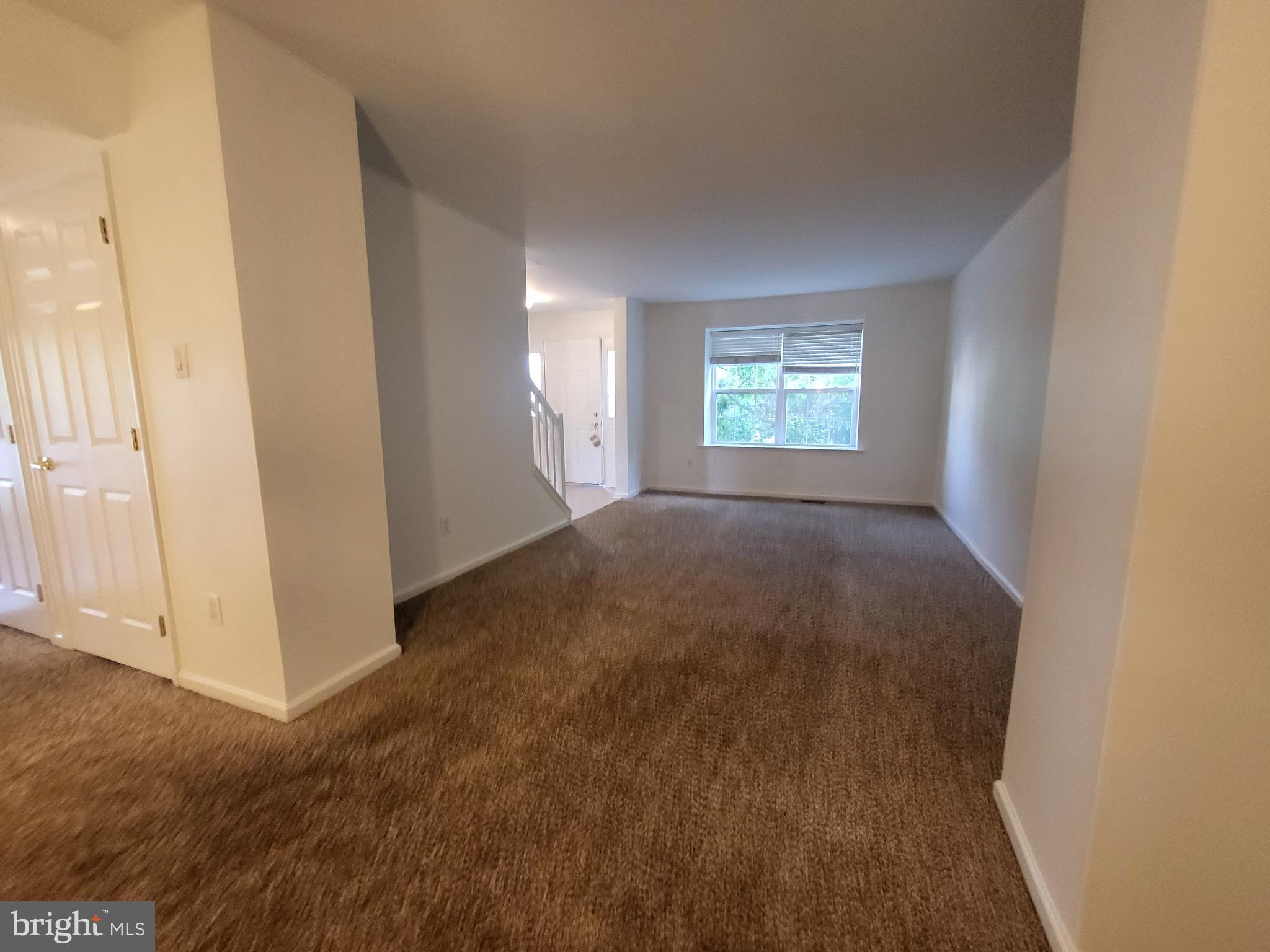 284 Flagstone Road, Unit 5 Chester Springs, PA 19425 - Photo 7 of 25 an empty room with windows