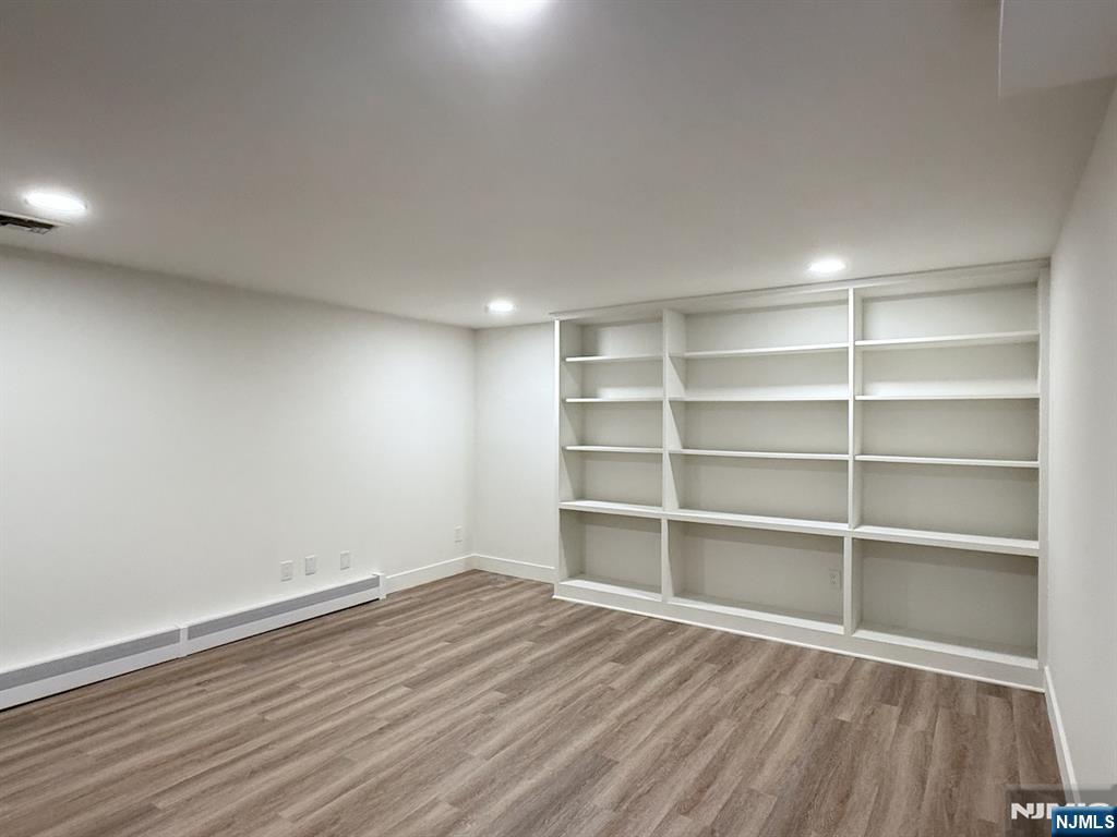 46 Overlook Road Alpine, NJ 07620 - Photo 14 of 18 a view of a room with wooden floor and closet