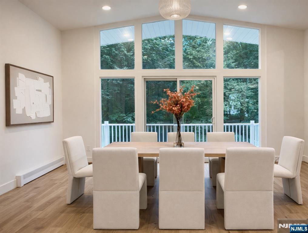 46 Overlook Road Alpine, NJ 07620 - Photo 6 of 18 a view of a dining room with furniture window and outside view