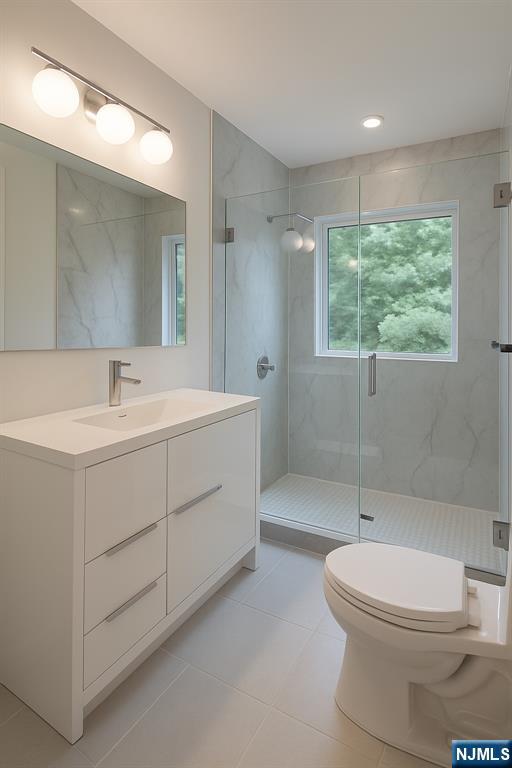 46 Overlook Road Alpine, NJ 07620 - Photo 10 of 18 a bathroom with a sink a toilet and shower