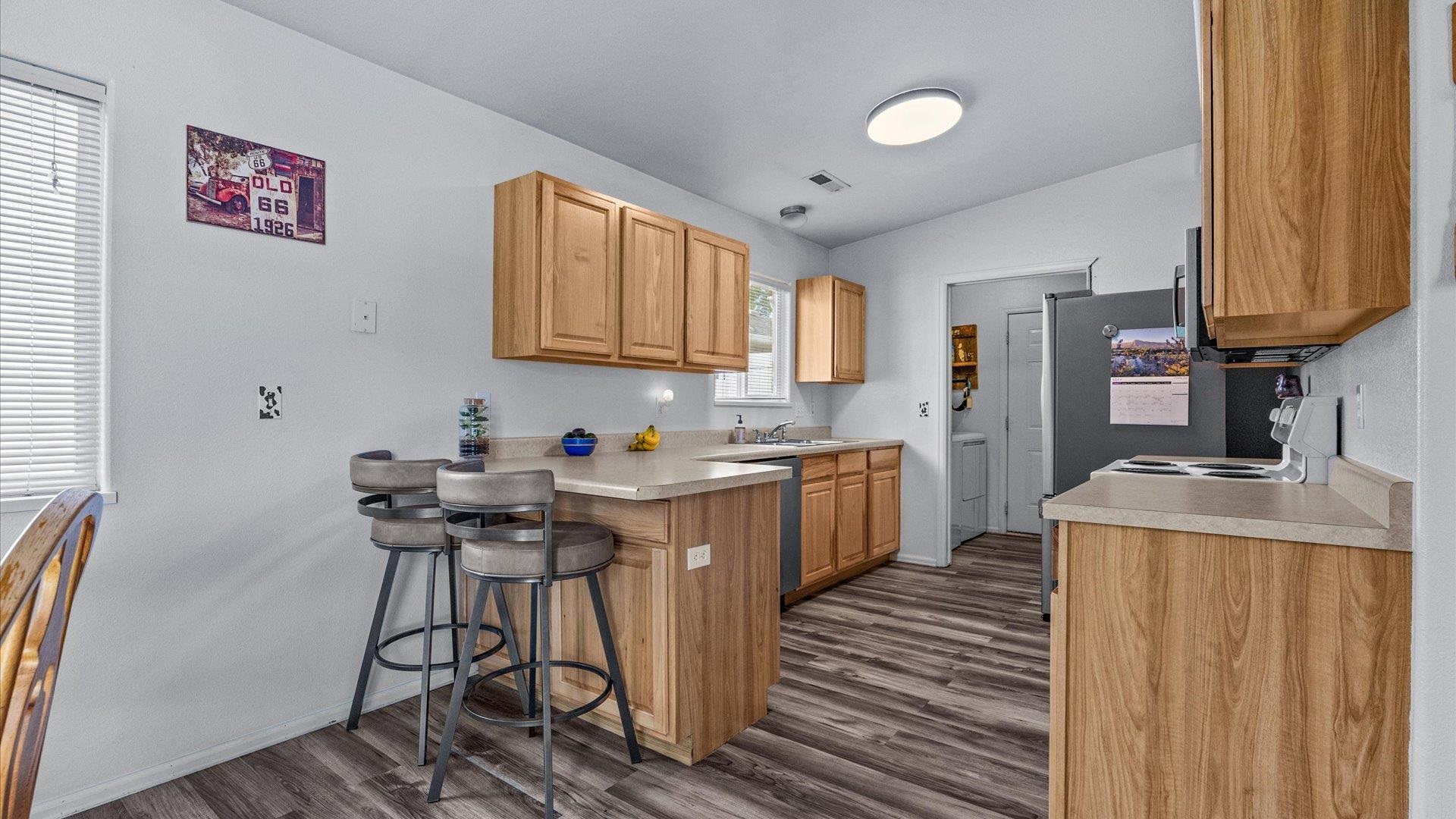 420-29 29 1/2 Road Grand Junction, CO 81504 - Photo 11 of 26 a kitchen with a sink cabinets and window