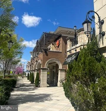 front view of a house with a garden