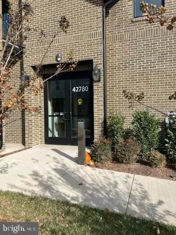 a view of a brick building with a entrance