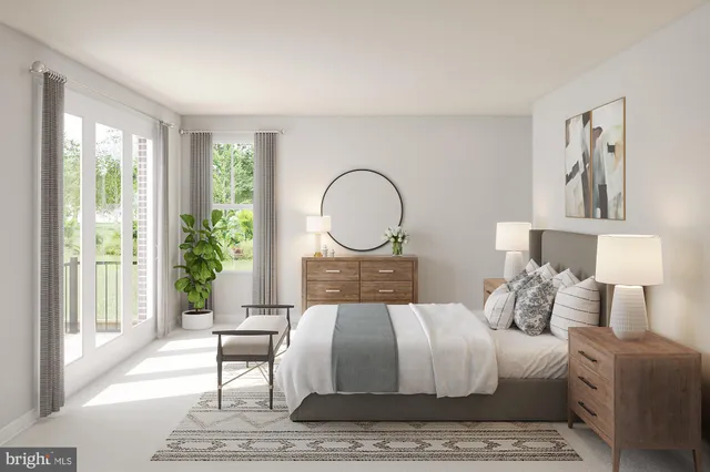 a bedroom with a bed a mirror and a large window with the garden view
