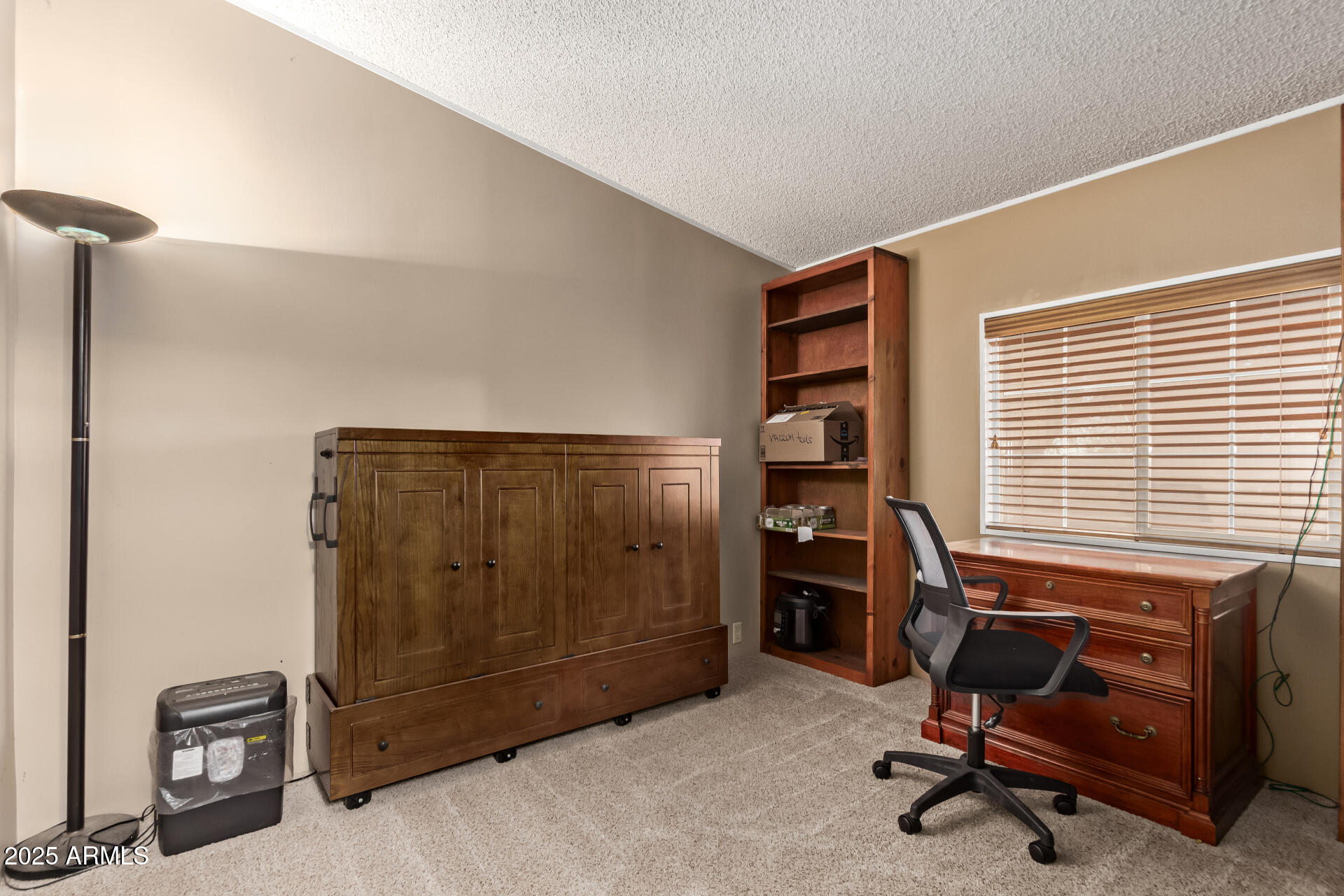 164 North Wickiup Road Apache Junction, AZ 85119 - Photo 26 of 62 a view of a livingroom with furniture