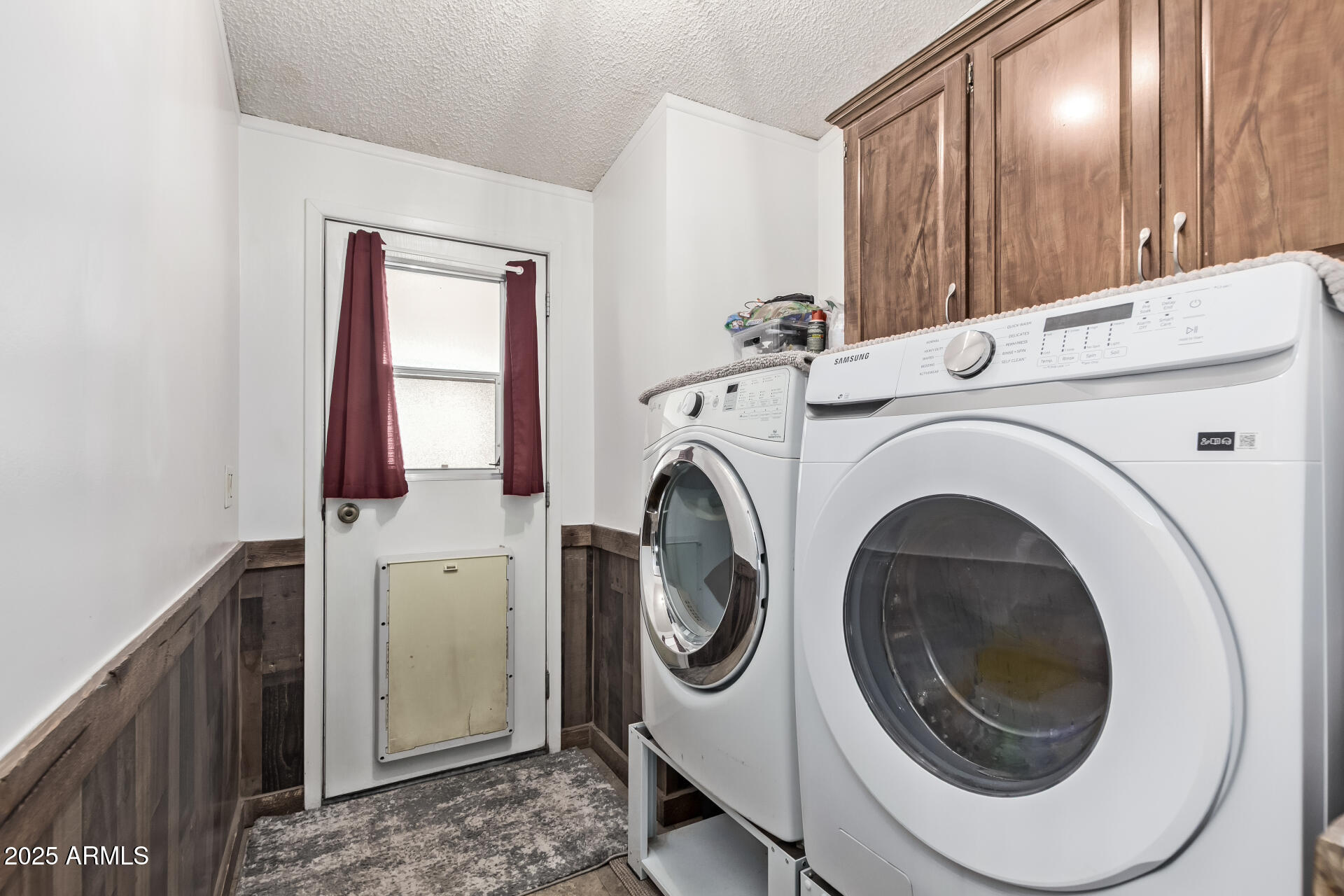 164 North Wickiup Road Apache Junction, AZ 85119 - Photo 29 of 62 a utility room with dryer and washer