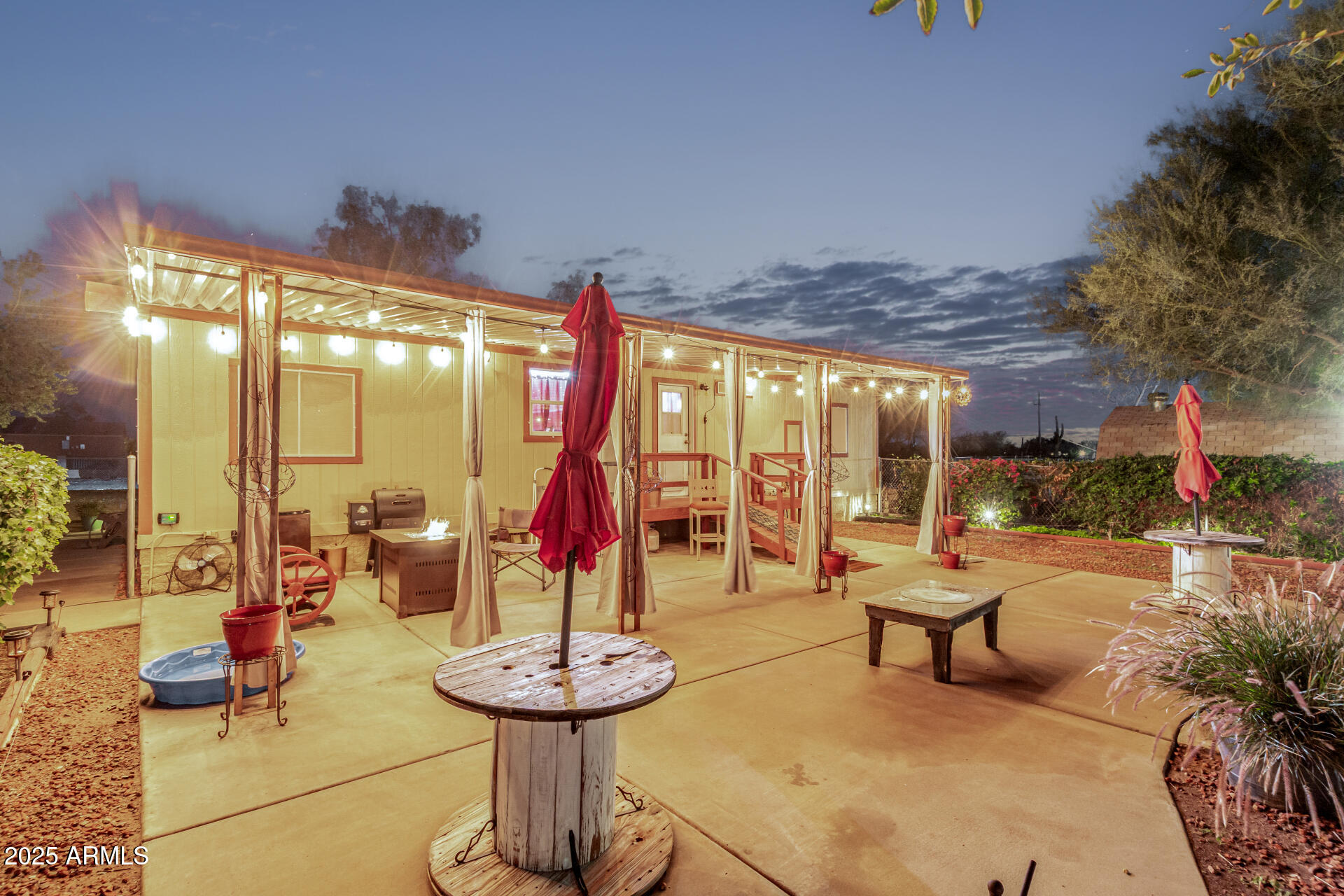 164 North Wickiup Road Apache Junction, AZ 85119 - Photo 3 of 62 a building outdoor space with patio furniture and potted plants
