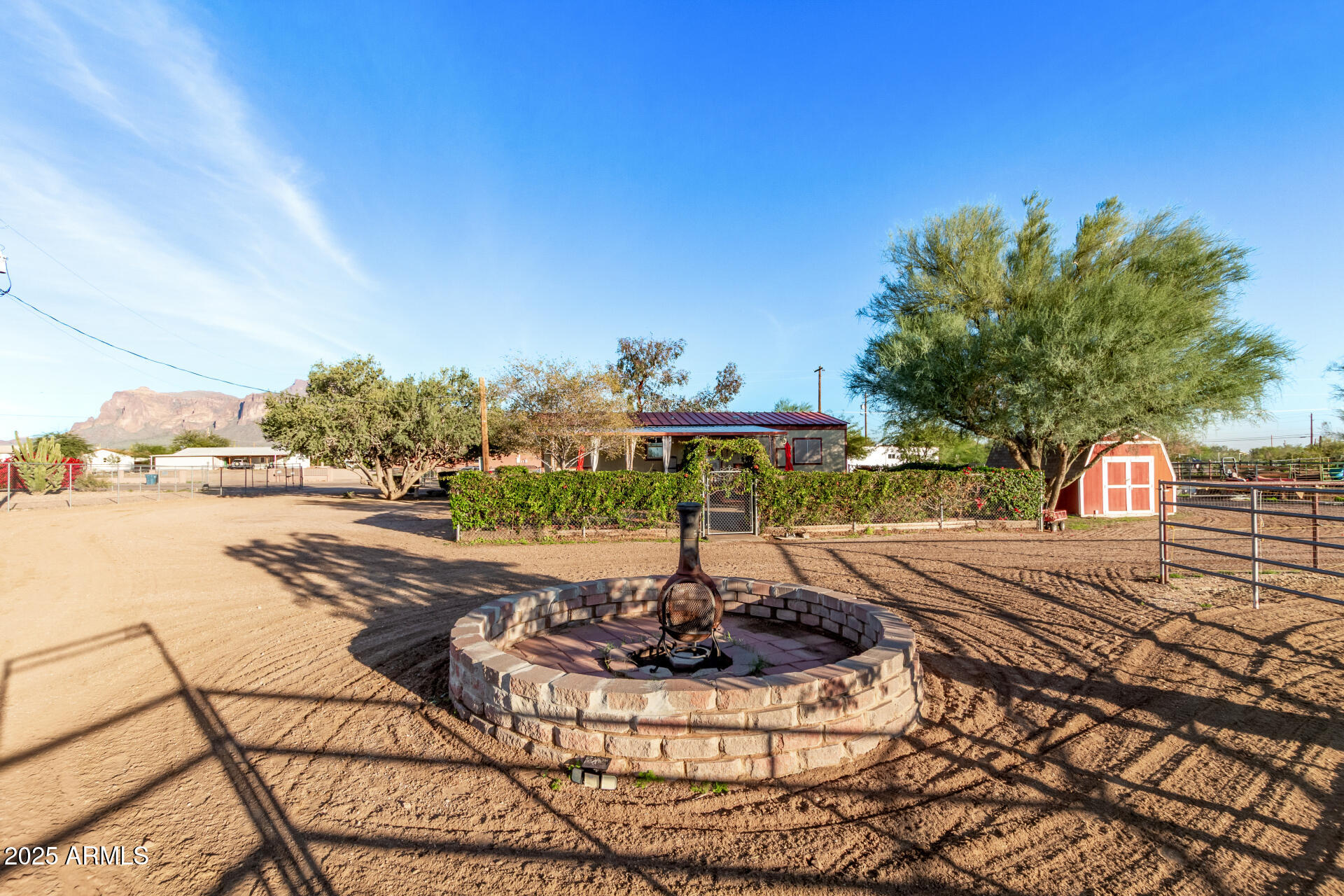 164 North Wickiup Road Apache Junction, AZ 85119 - Photo 35 of 62 a view of a swimming pool with an outdoor seating