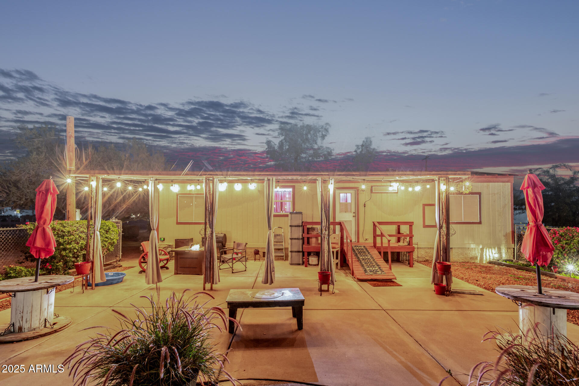 164 North Wickiup Road Apache Junction, AZ 85119 - Photo 53 of 62 a view of a porch with dining table and chairs