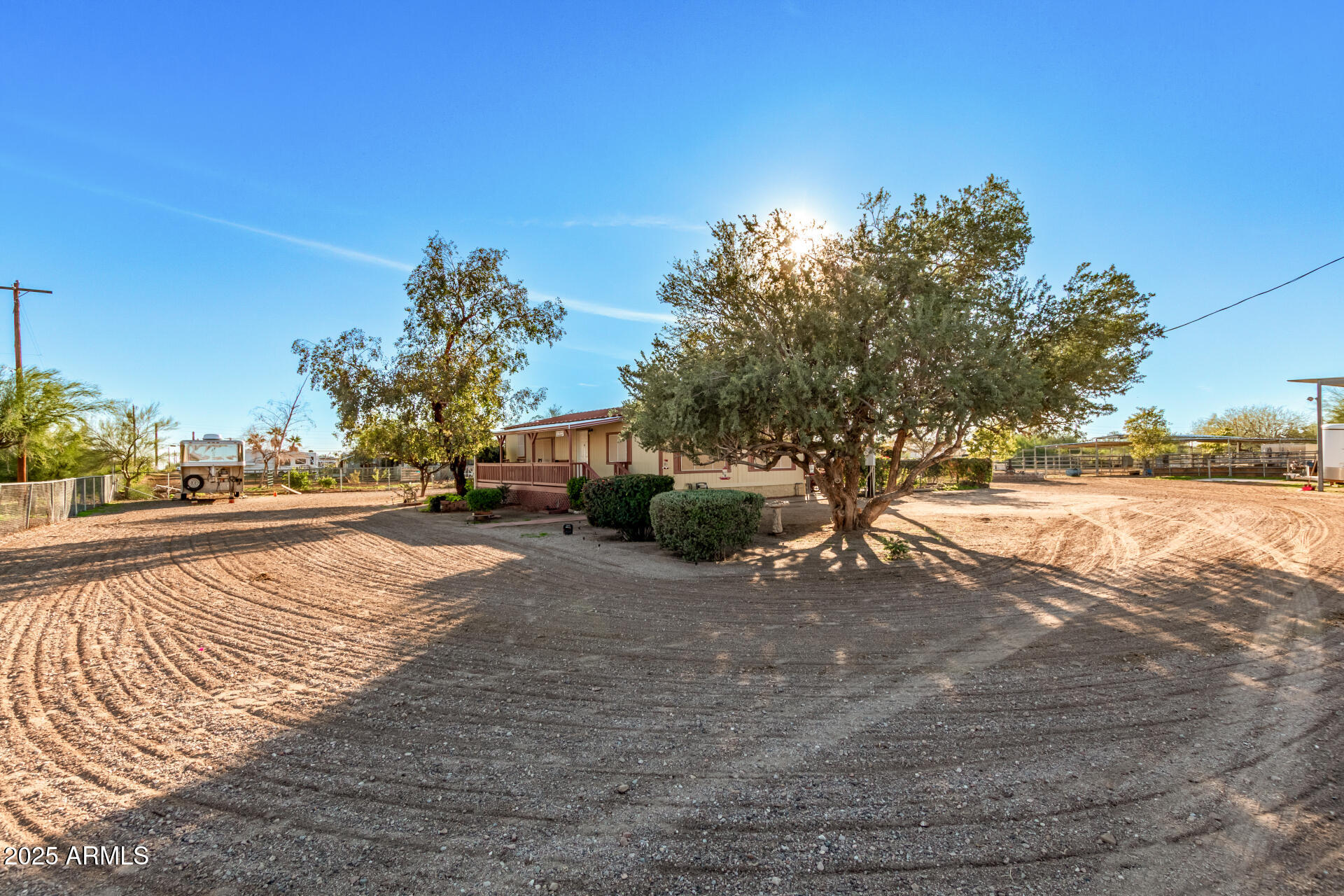 164 North Wickiup Road Apache Junction, AZ 85119 - Photo 7 of 62 a view of a street with houses