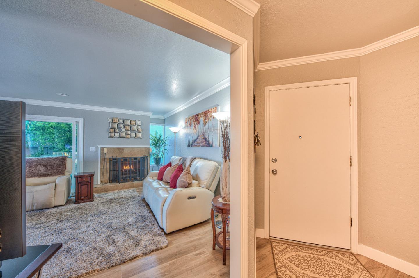 2224 Almaden Road, Unit A San Jose, CA 95125 - Photo 11 of 29 a bed room with a bed and a fireplace