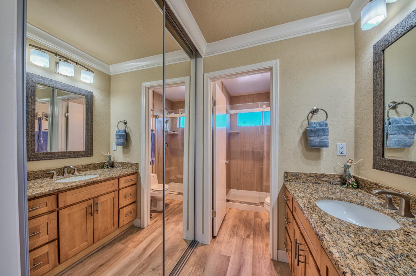 2224 Almaden Road, Unit A San Jose, CA 95125 - Photo 17 of 29 a bathroom with a granite countertop sink mirror vanity and shower