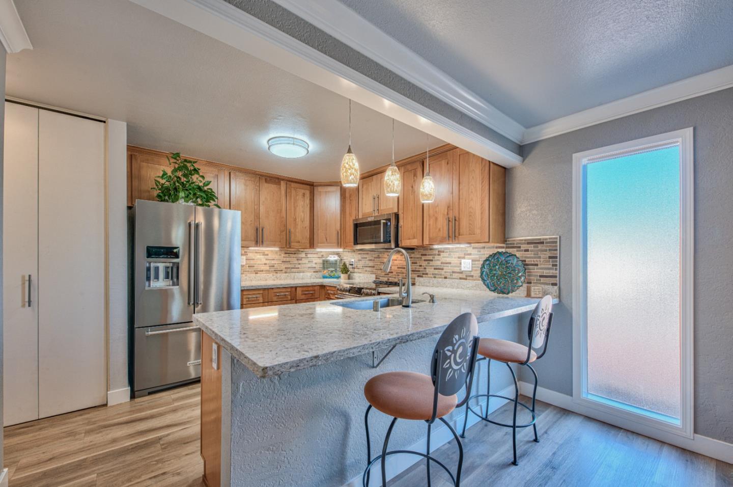 2224 Almaden Road, Unit A San Jose, CA 95125 - Photo 2 of 29 a kitchen with refrigerator and cabinets
