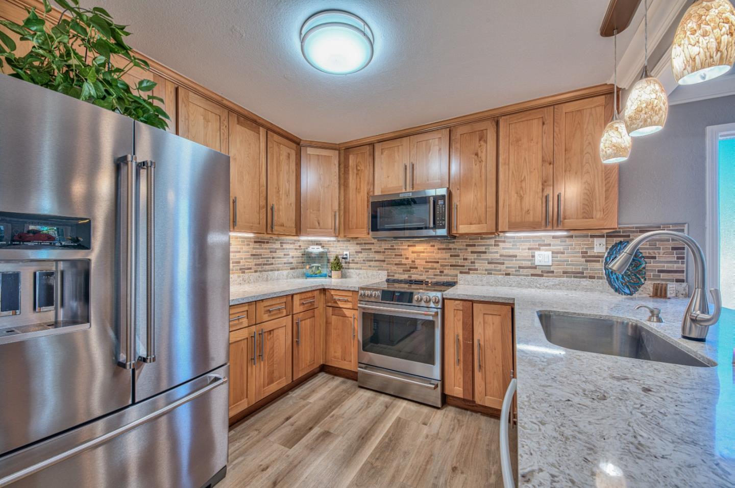 2224 Almaden Road, Unit A San Jose, CA 95125 - Photo 3 of 29 a kitchen with stainless steel appliances granite countertop a refrigerator stove and sink