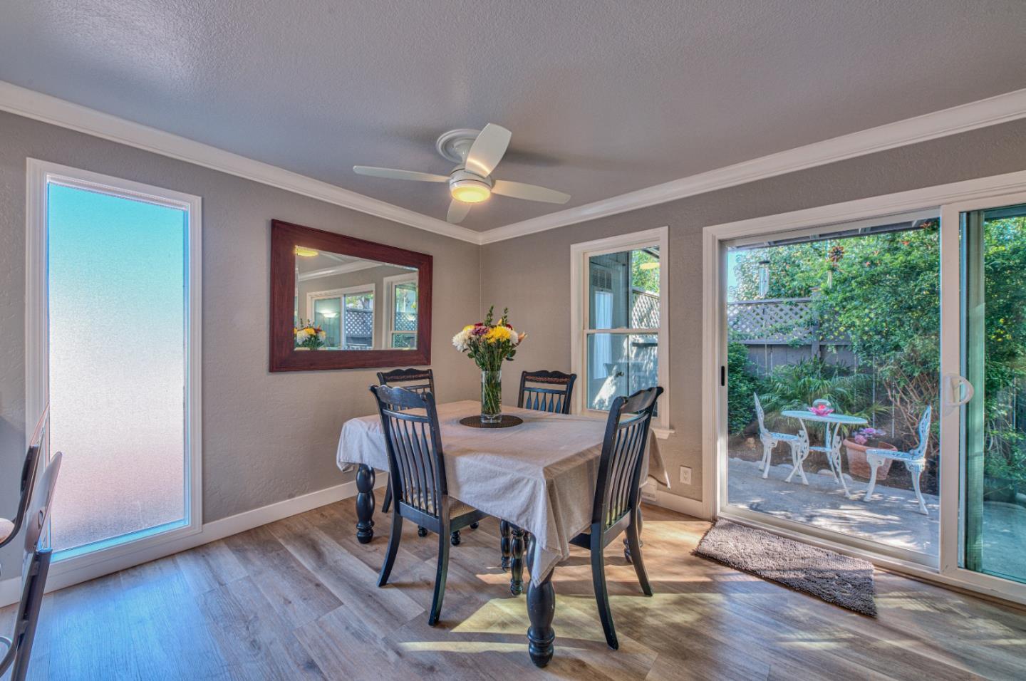 2224 Almaden Road, Unit A San Jose, CA 95125 - Photo 7 of 29 a view of a dining room with furniture a chandelier and wooden floor