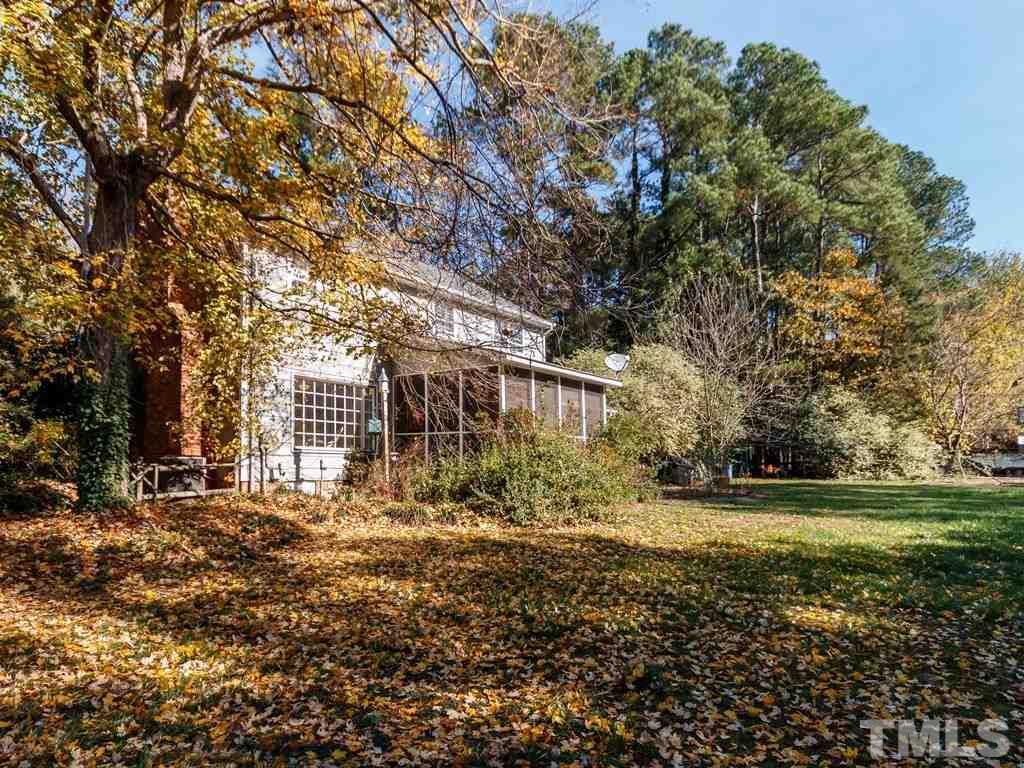 5704 Setter Circle Raleigh, NC 27609 - Photo 4 of 25 a view of a house with a yard