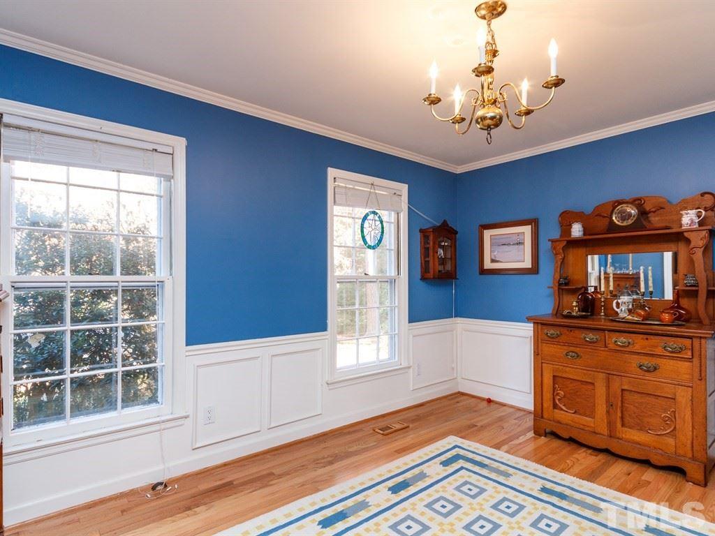 5704 Setter Circle Raleigh, NC 27609 - Photo 5 of 25 a living room with furniture and a window