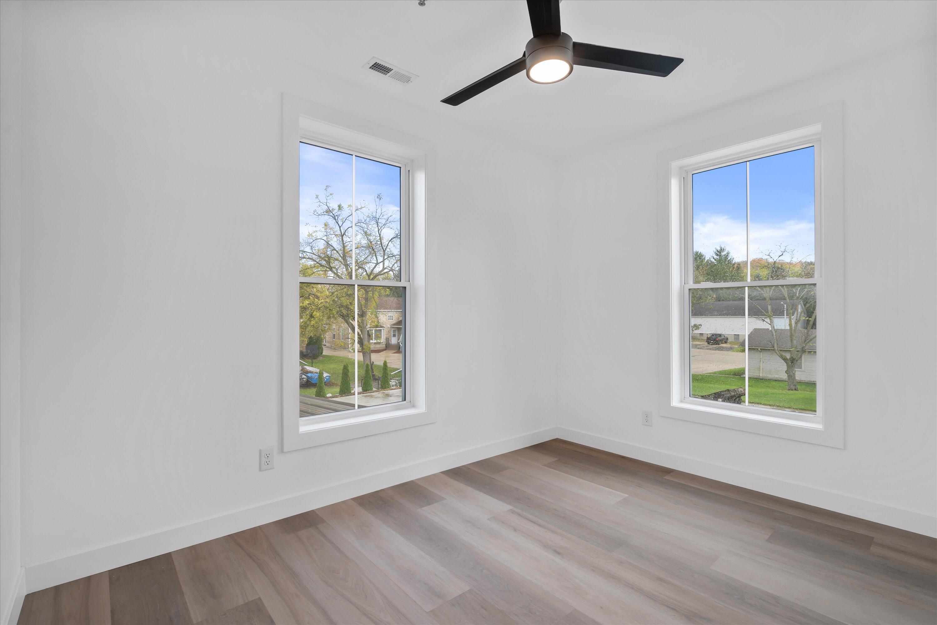 308 Oak Street, Unit 201 Slinger, WI 53086 - Photo 16 of 20 Den