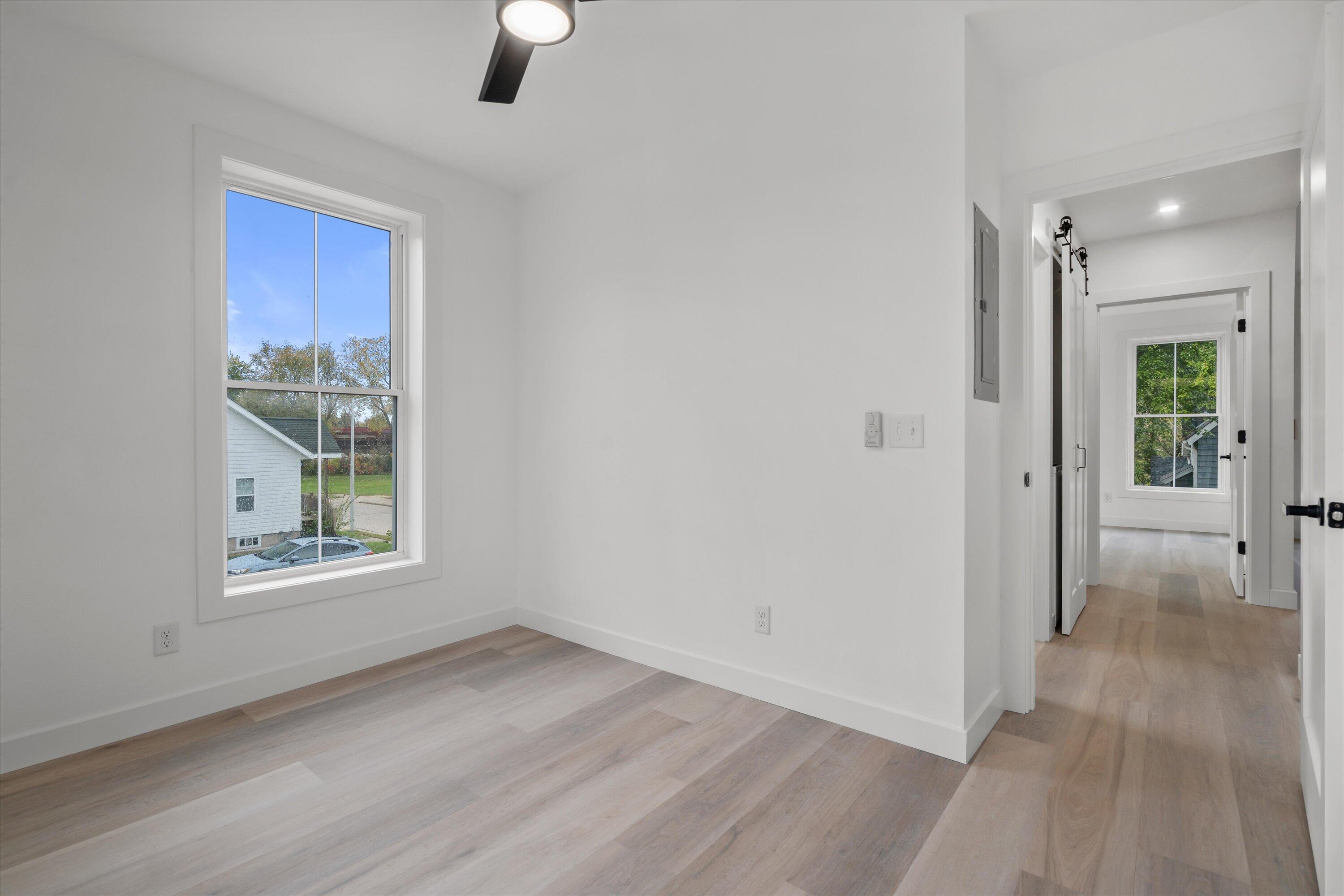 308 Oak Street, Unit 201 Slinger, WI 53086 - Photo 17 of 20 Den