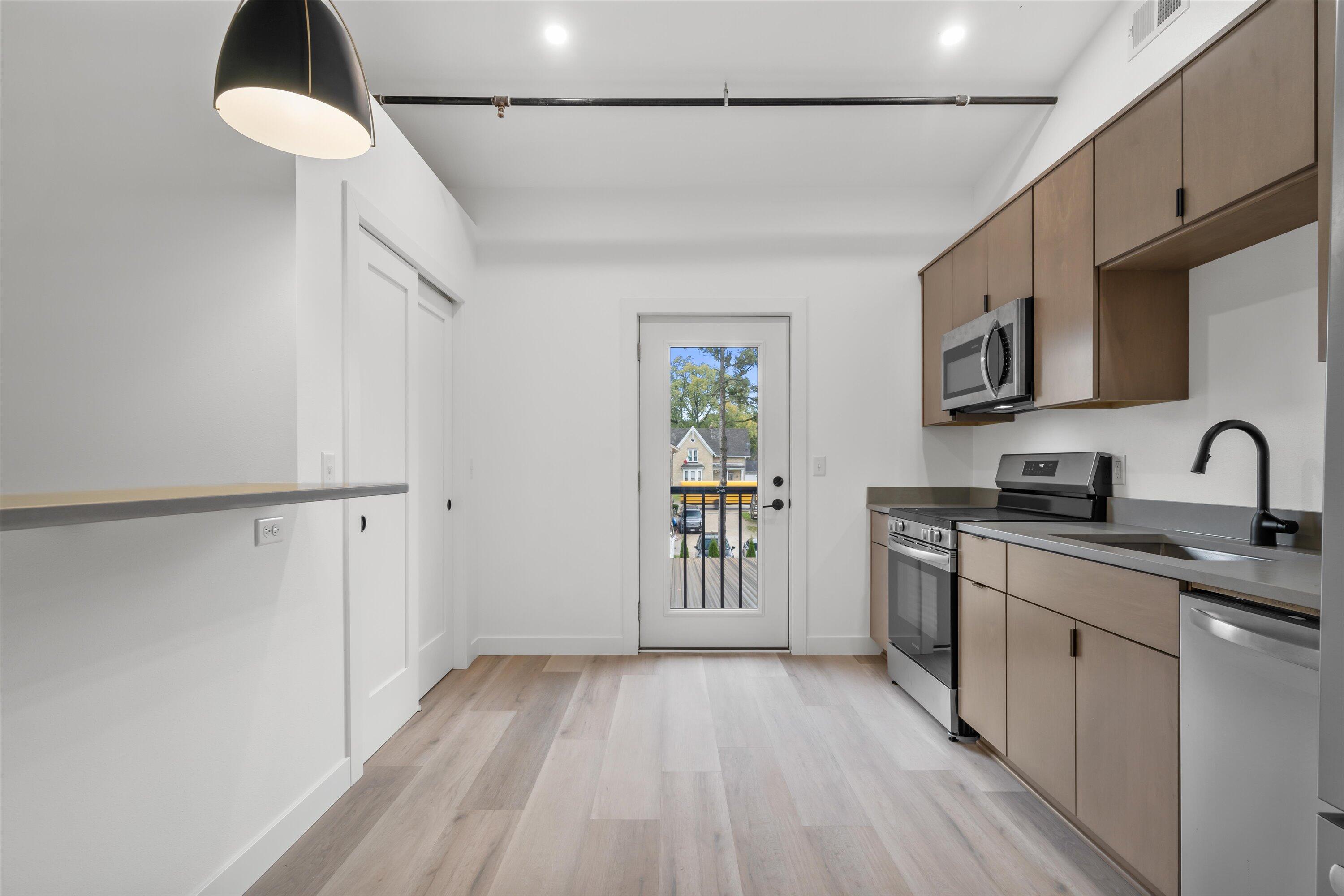 308 Oak Street, Unit 201 Slinger, WI 53086 - Photo 4 of 20 Kitchen