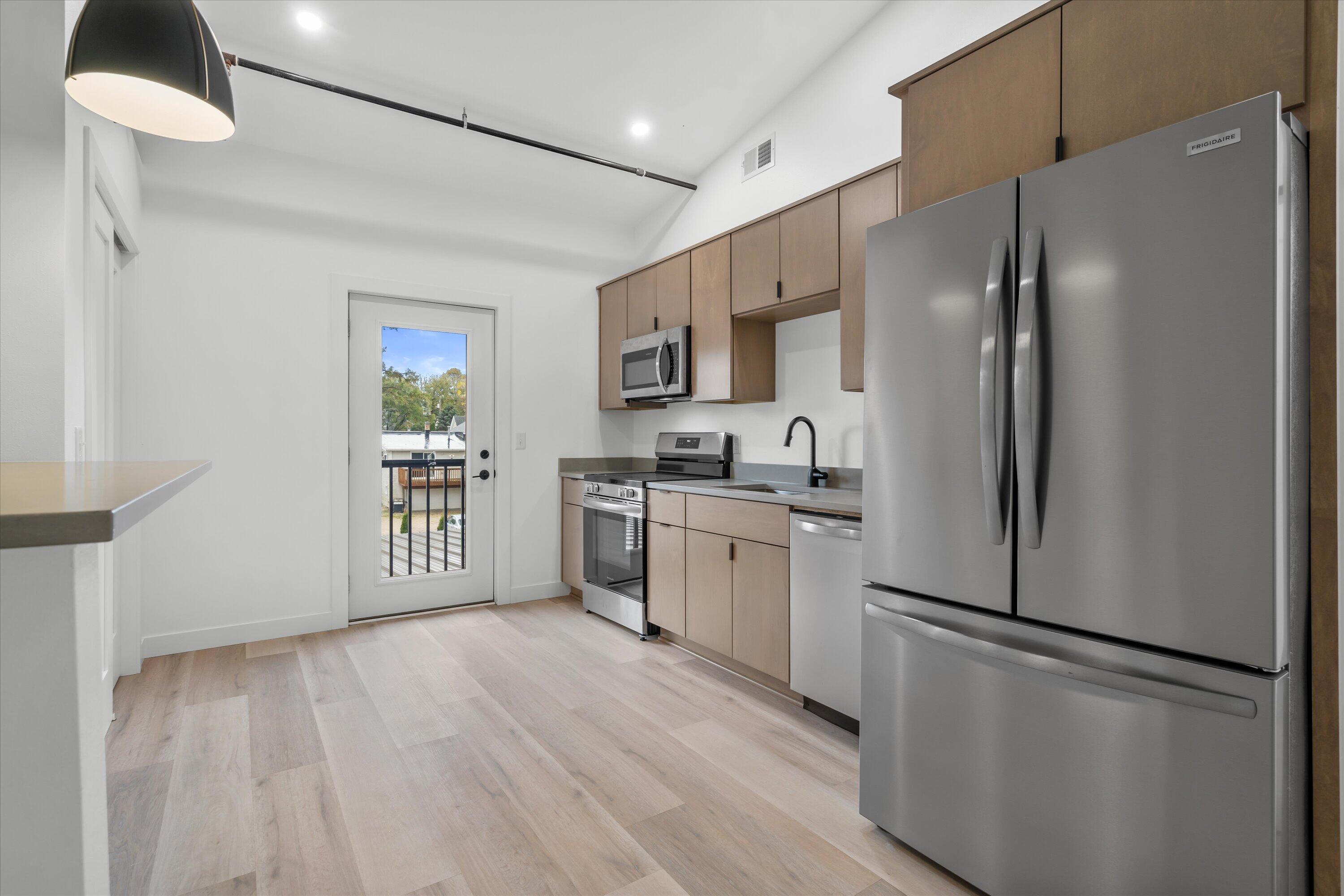 308 Oak Street, Unit 201 Slinger, WI 53086 - Photo 6 of 20 Kitchen