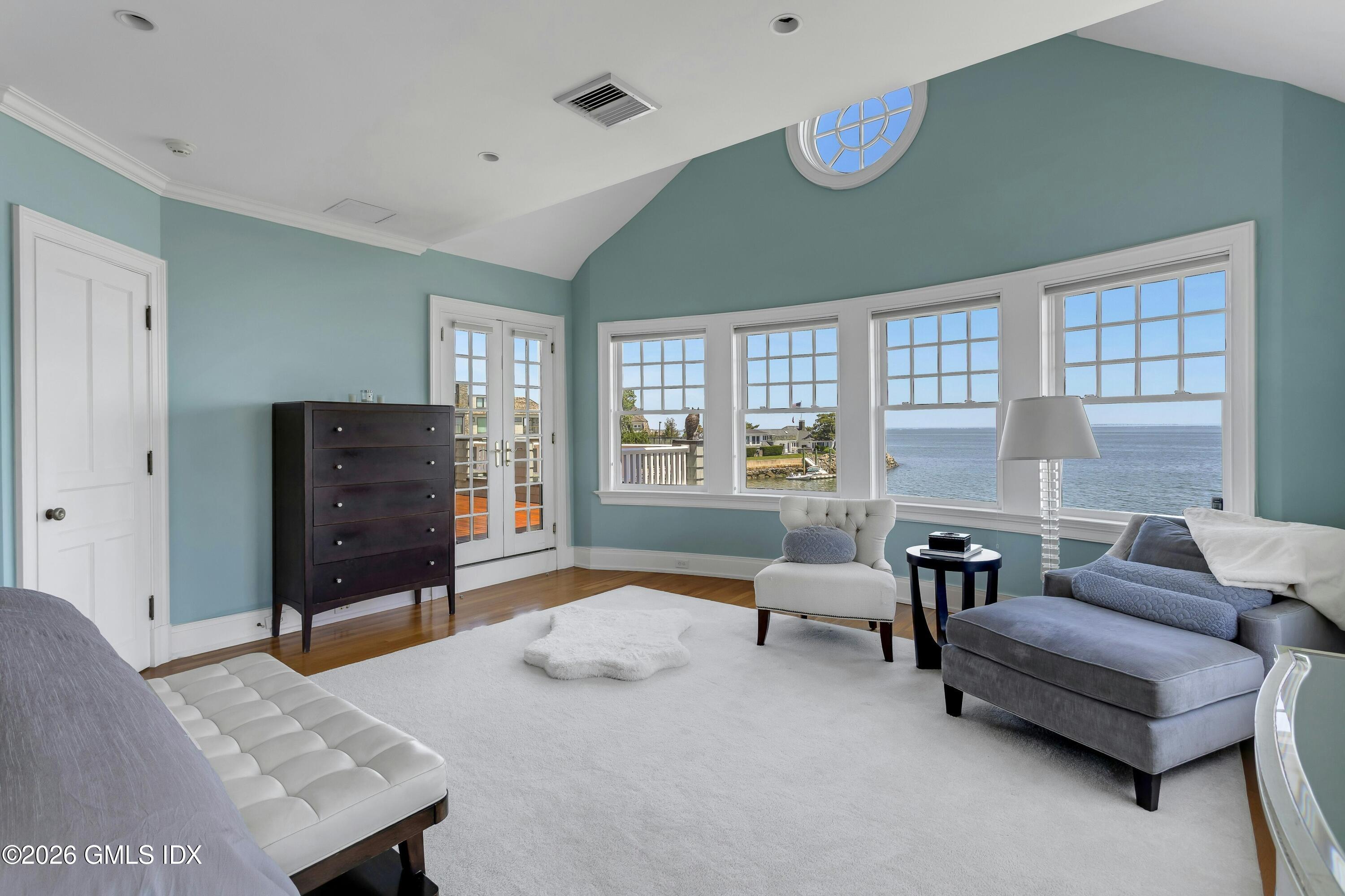 200 Shore Road Old Greenwich, CT 06870 - Photo 12 of 34 a living room with furniture and a flat screen tv