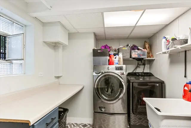 a view of a storage and utility room with racks on the wall