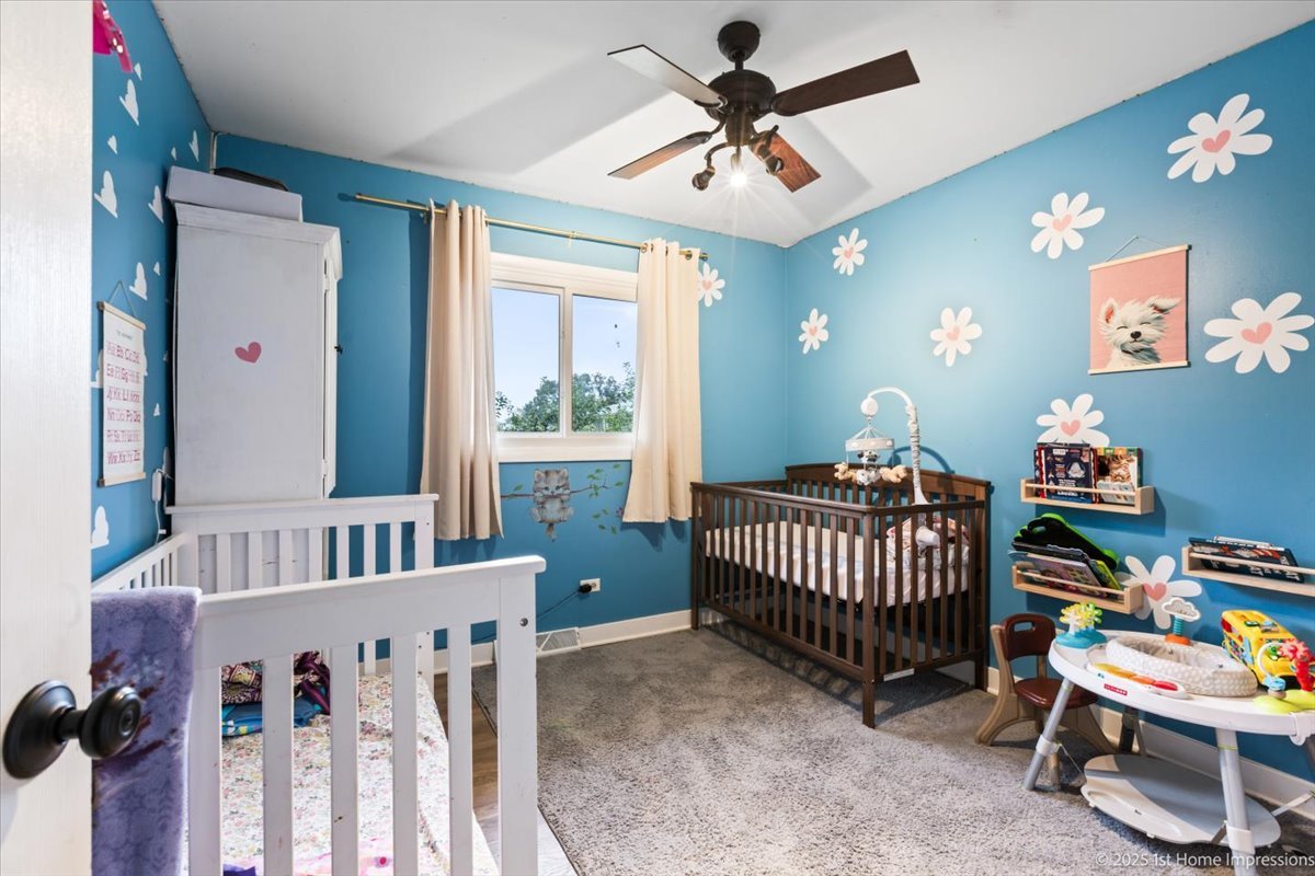 15309 Walnut Road Oak Forest, IL 60452 - Photo 10 of 23 a bedroom with furniture and a window